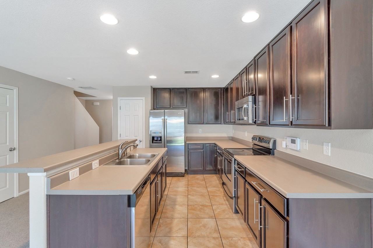 19209 E 58th Ave #B - Photo 3 of 18