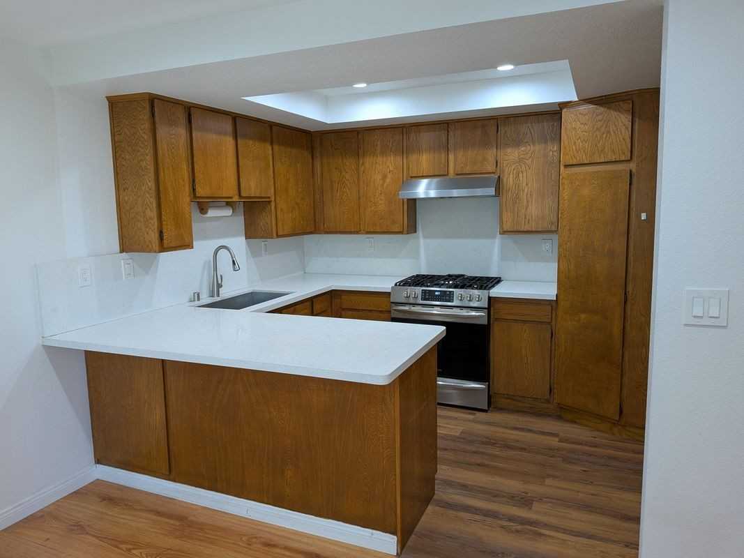 15214 S Raymond Ave ##105 - Photo 6 of 7