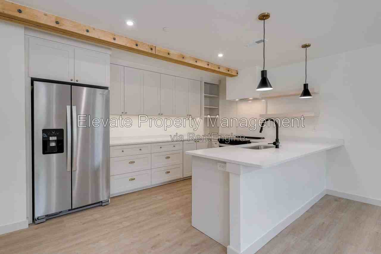 844 Nw 43rd St #104 - Photo 3 of 9