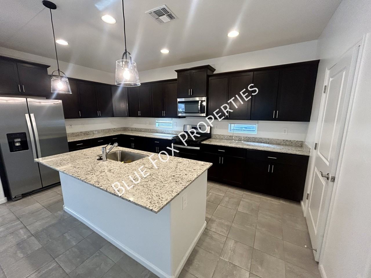 6973 W Jadewood Ln - Photo 5 of 39