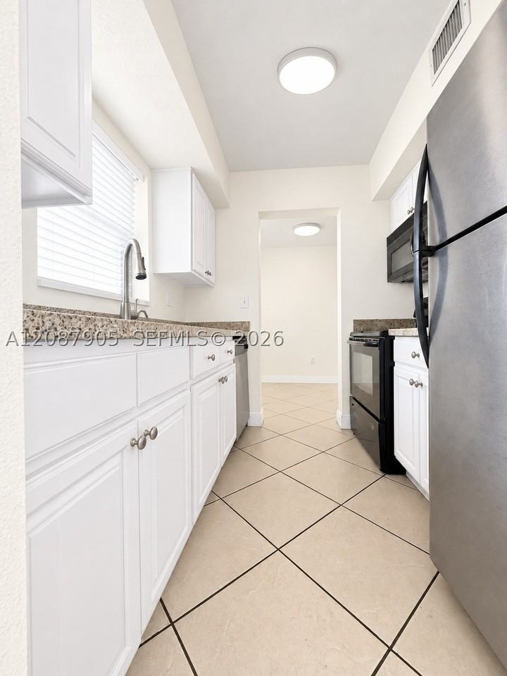8475 Sw 94th St #108E - Photo 4 of 33