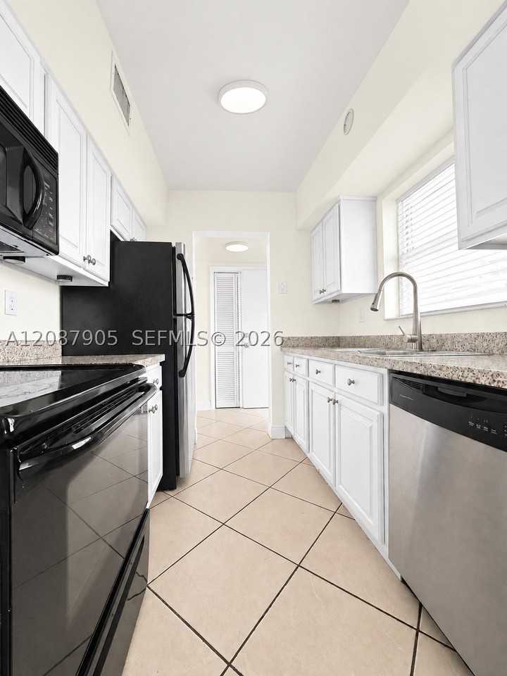 8475 Sw 94th St #108E - Photo 5 of 33