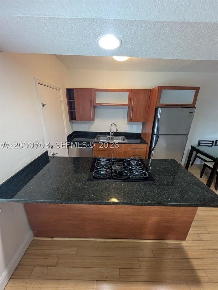 10101 W Bay Harbor Dr #9 - Photo 2 of 5