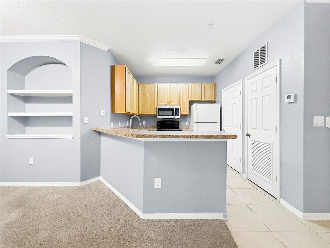 10209 Courtney Palms Blvd #203 - Photo 2 of 25