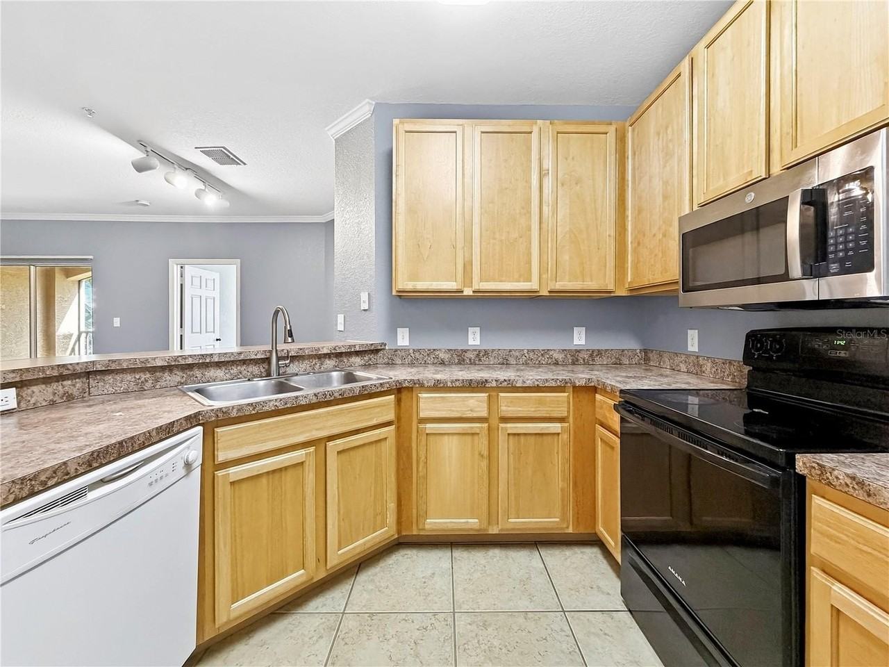 10209 Courtney Palms Blvd #203 - Photo 3 of 25