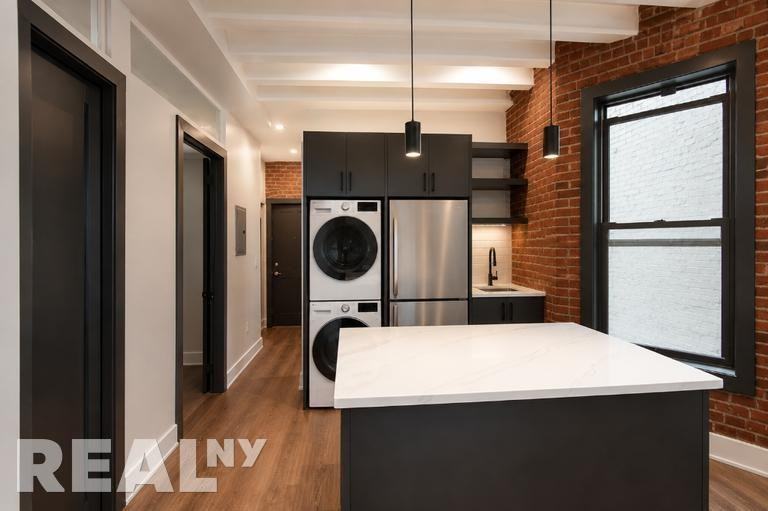 Mott St #13-14 - Photo 2 of 4