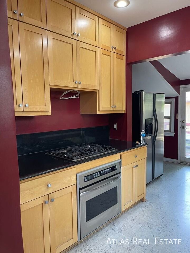2294 S Ogden St - Photo 5 of 15