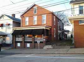 featured image of 115 W 3rd St