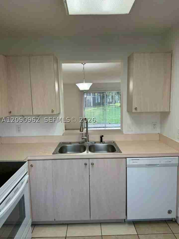 8740 N Sherman Cir #102 - Photo 2 of 20