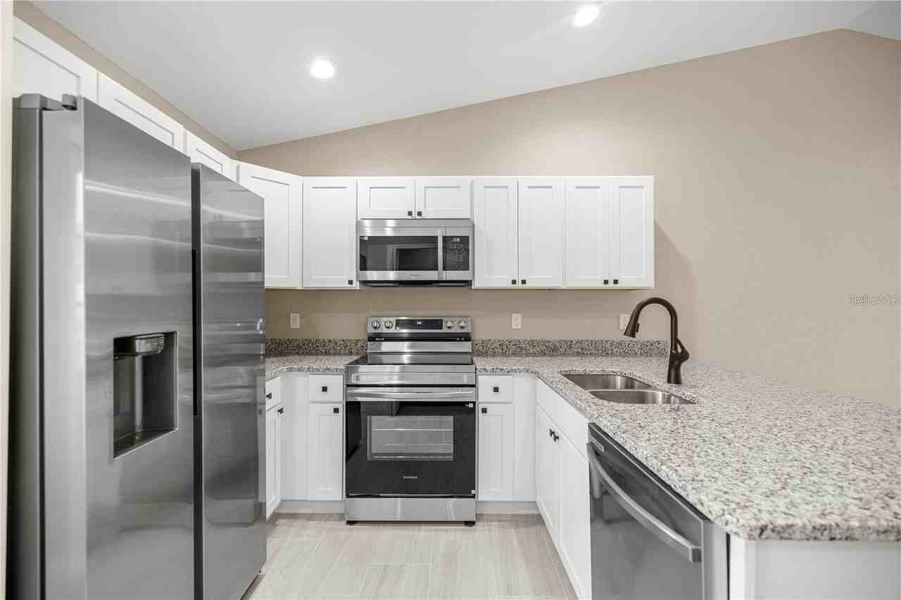 5795 NW 11th Pl - Photo 7 of 10