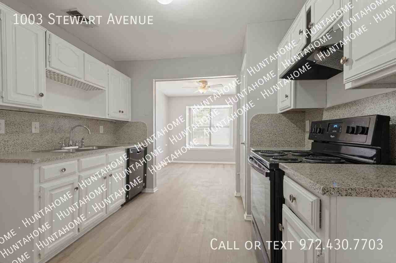 1003 Stewart Ave - Photo 4 of 12