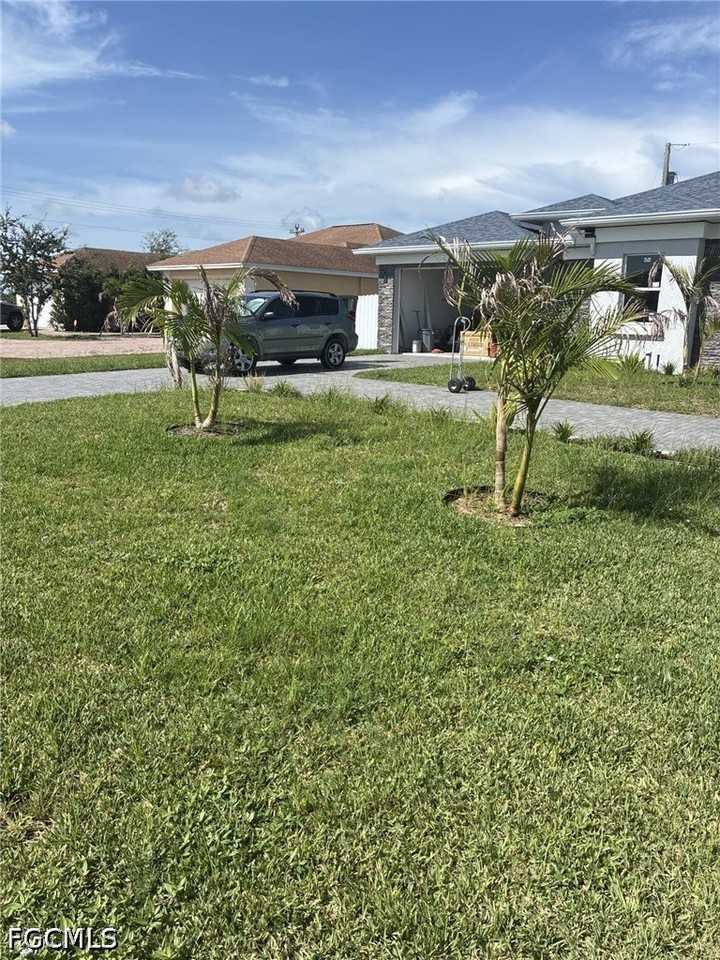 908 Ne 8th Pl - Photo 3 of 14