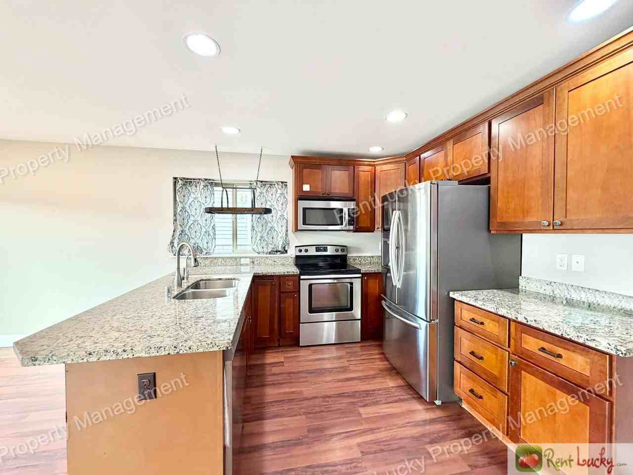 6826 S J St - Photo 5 of 30