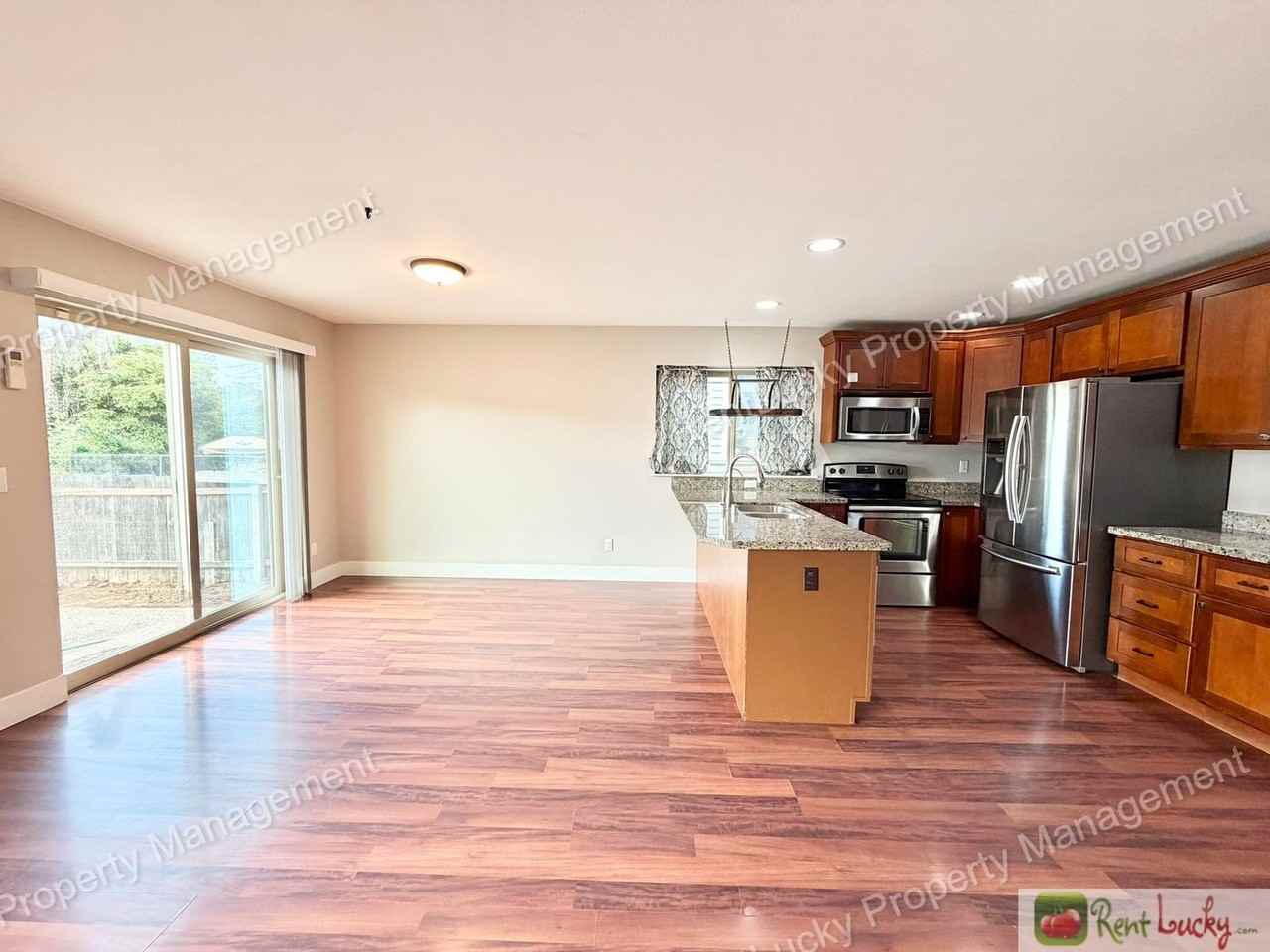 6826 S J St - Photo 6 of 30