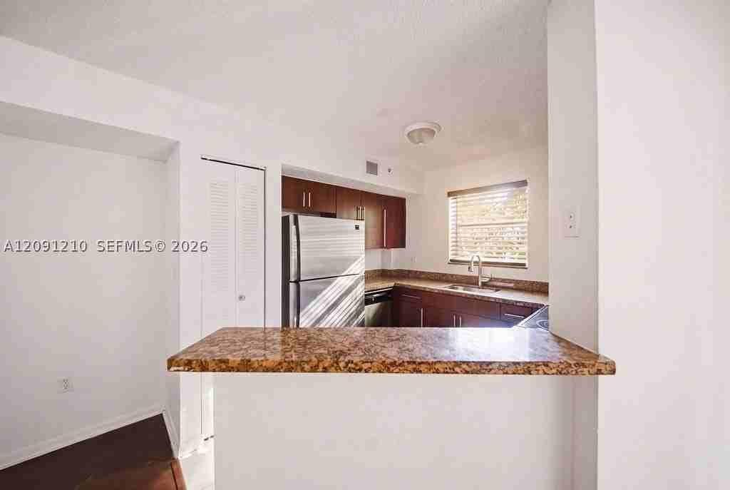 771 N Pine Island Rd #205 - Photo 2 of 20