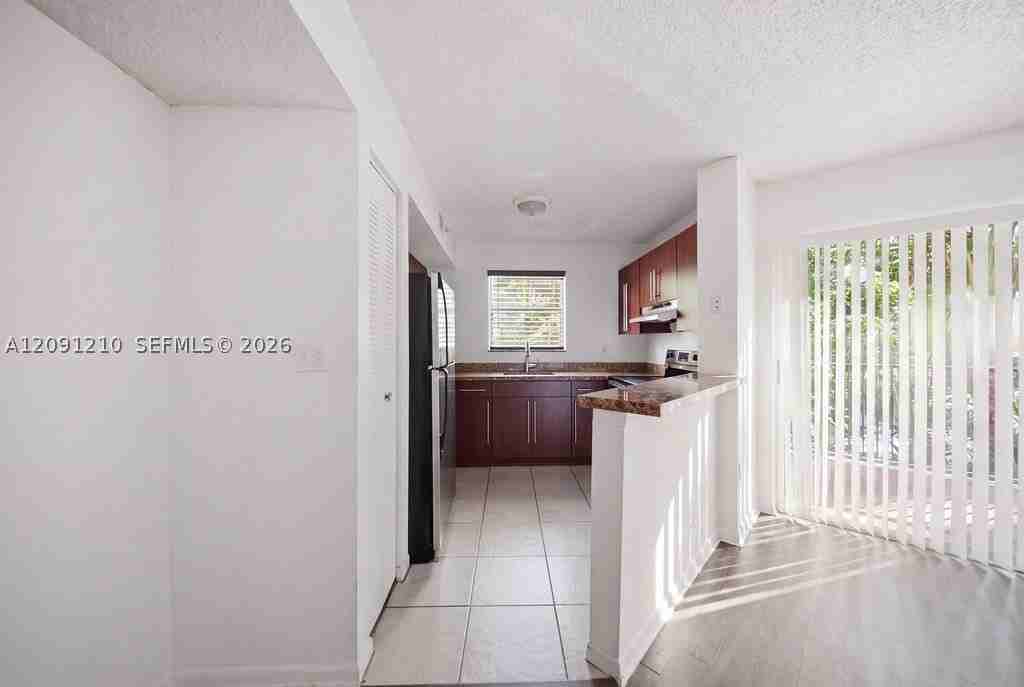 771 N Pine Island Rd #205 - Photo 3 of 20