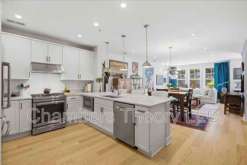 1418 N Rhodes St #B117 - Photo 2 of 32