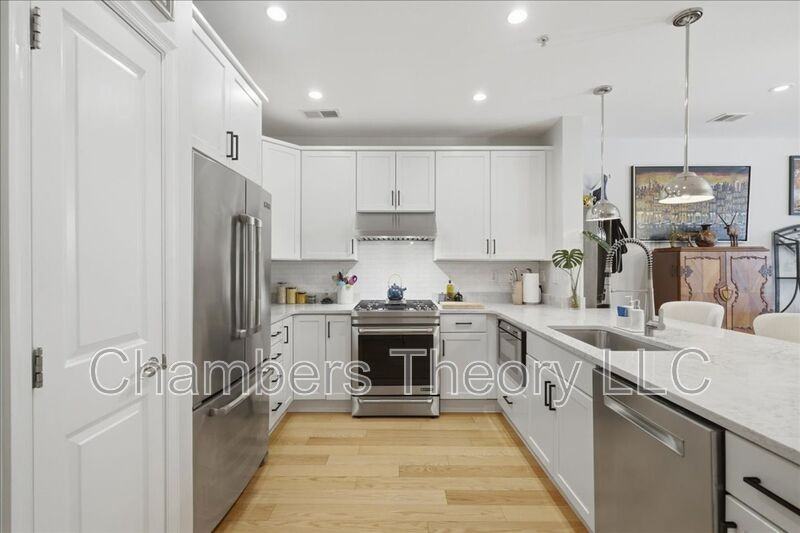 1418 N Rhodes St #B117 - Photo 3 of 32