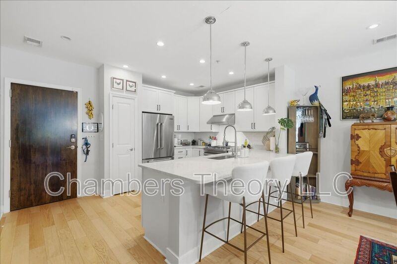 1418 N Rhodes St #B117 - Photo 5 of 32