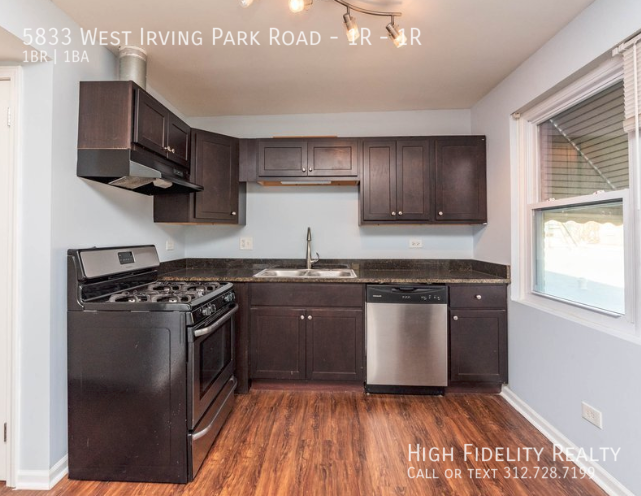 5833 W Irving Park Rd #1R - Photo 3 of 3