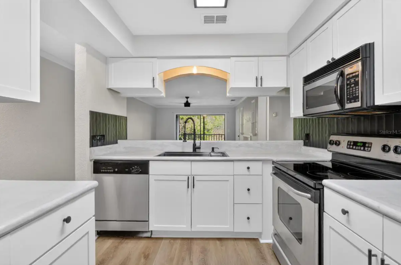 10167 Sailwinds Blvd N - Photo 4 of 36