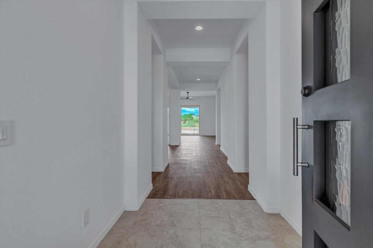10818 E Tesla Ave - Photo 4 of 32