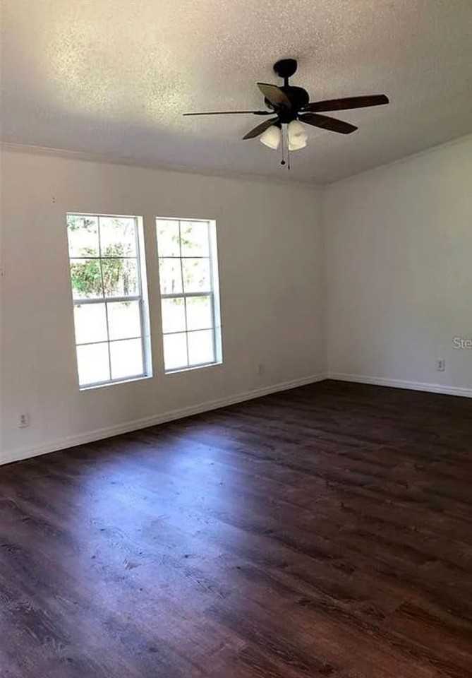 16287 Nw 100th Avenue Rd - Photo 4 of 6