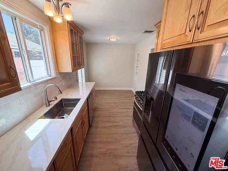 11844 Graystone Avenue - Photo 3 of 9