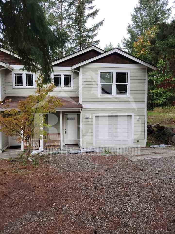 10309 Frontier Pl Nw - Photo 3 of 24