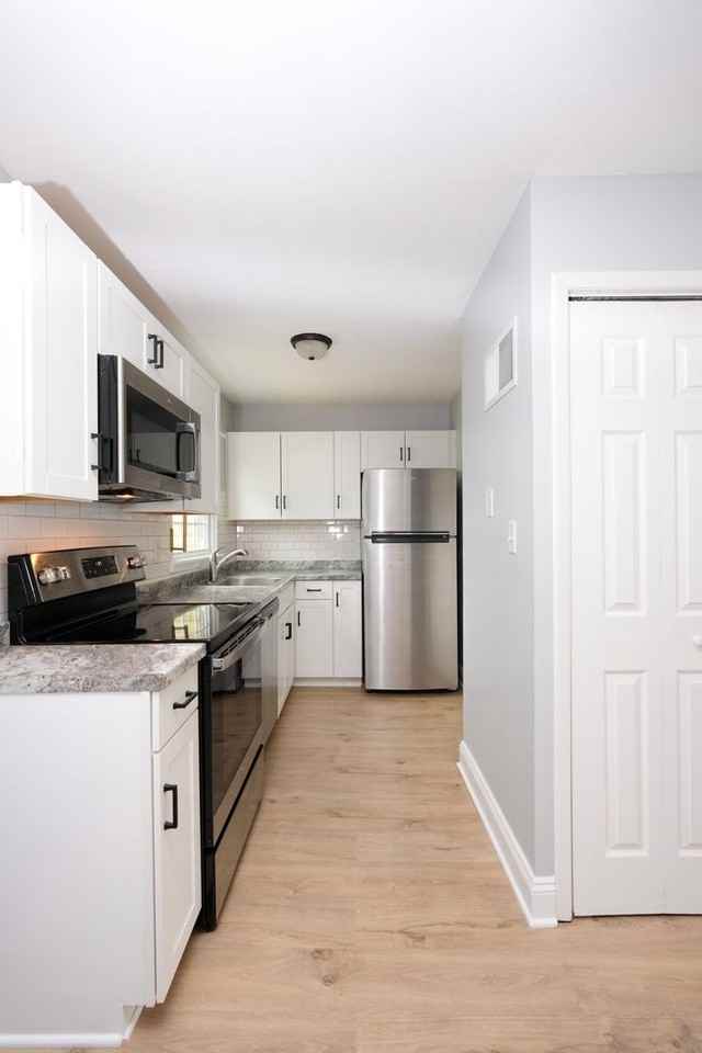 1421 E Caracas Ave - Photo 4 of 35