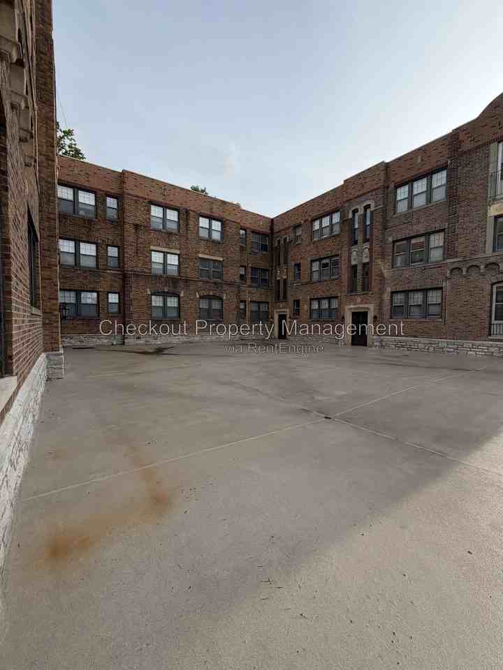 7334 Forsyth Blvd #101 - Photo 2 of 5