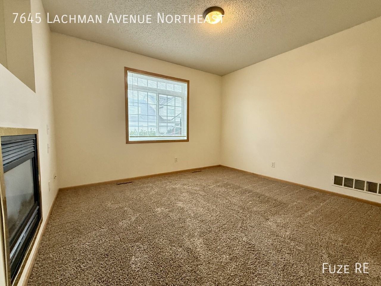 7645 Lachman Ave Ne - Photo 7 of 26