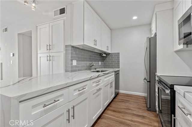 5301 Raintree Cir #301 - Photo 4 of 8