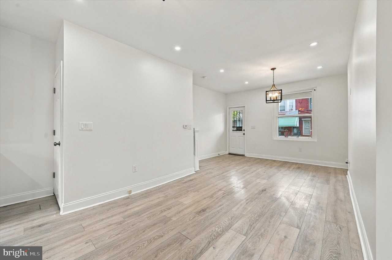 5744 Delancey St - Photo 2 of 20