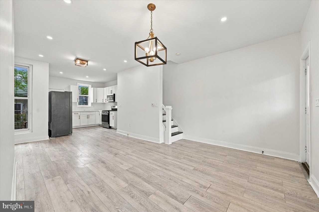 5744 Delancey St - Photo 4 of 20