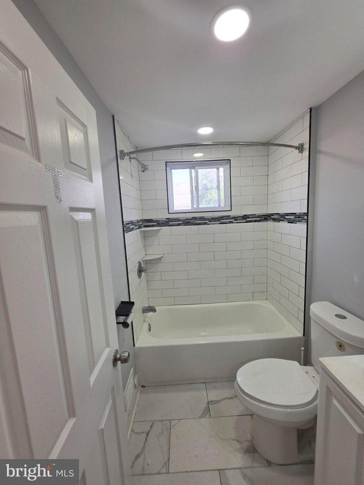 7701 Gilbert St - Photo 6 of 8