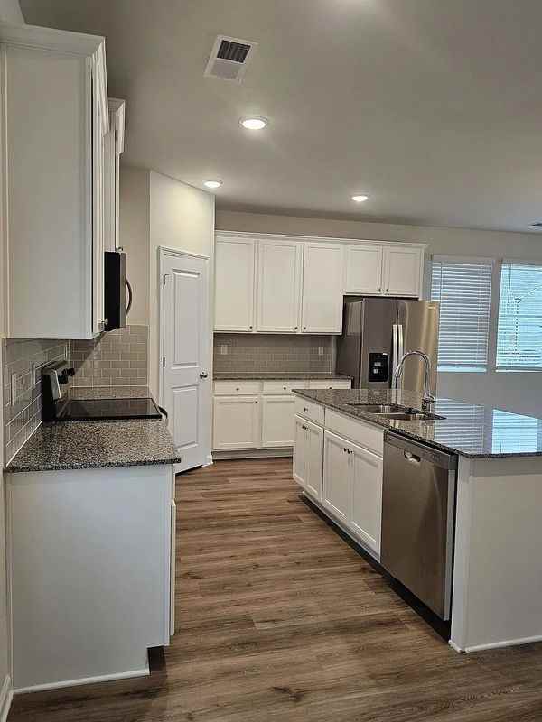 1056 Thomasville Estate Way - Photo 4 of 7
