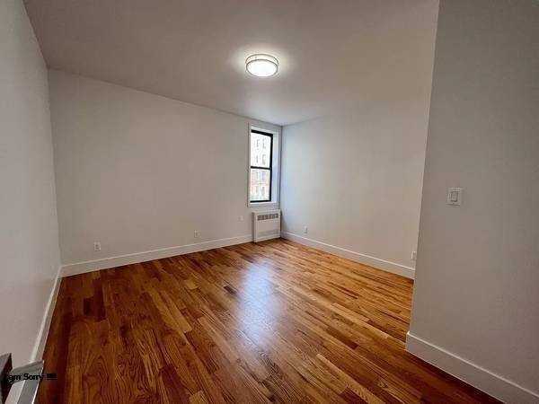 417 E 74th St - Photo 3 of 4