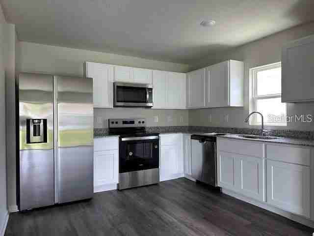 NW 22nd Ct & NW 23rd Lp - Photo 3 of 10