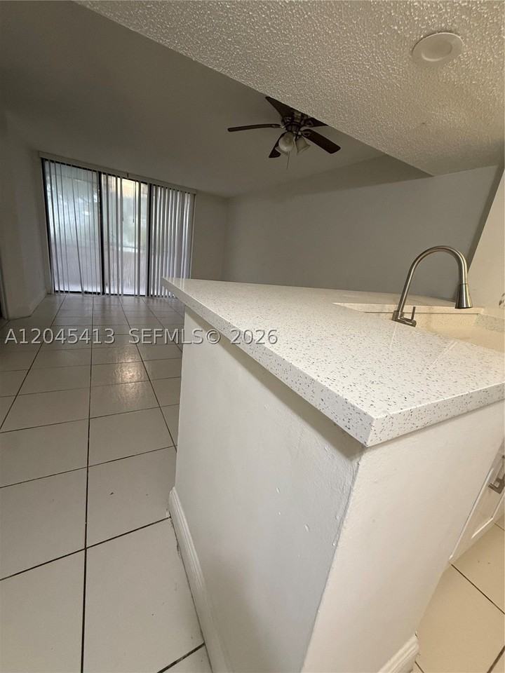 8255 Sw 152nd Ave #E209 - Photo 2 of 12