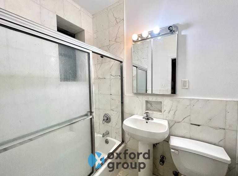 129 E 29th St - Photo 5 of 7