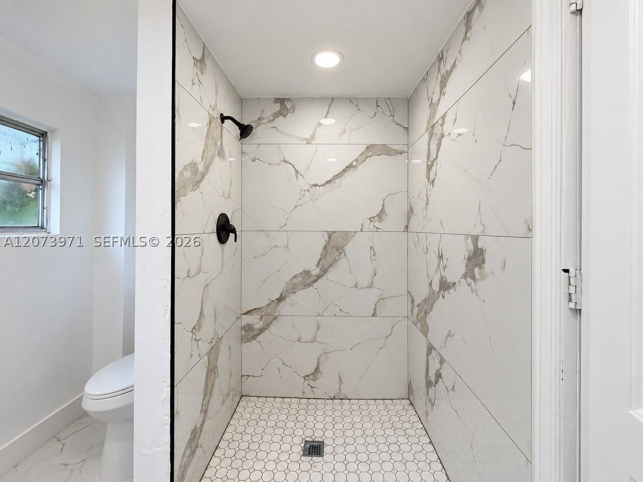 7560 Ne Miami Ct #1 - Photo 6 of 12