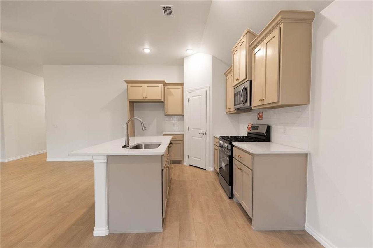 8708 Poppey Pl - Photo 2 of 16