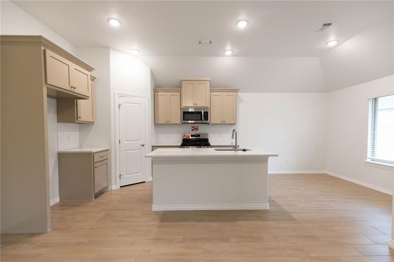 8708 Poppey Pl - Photo 3 of 16