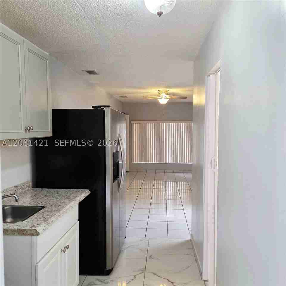 5871 Nw 199th St #5871L - Photo 4 of 13