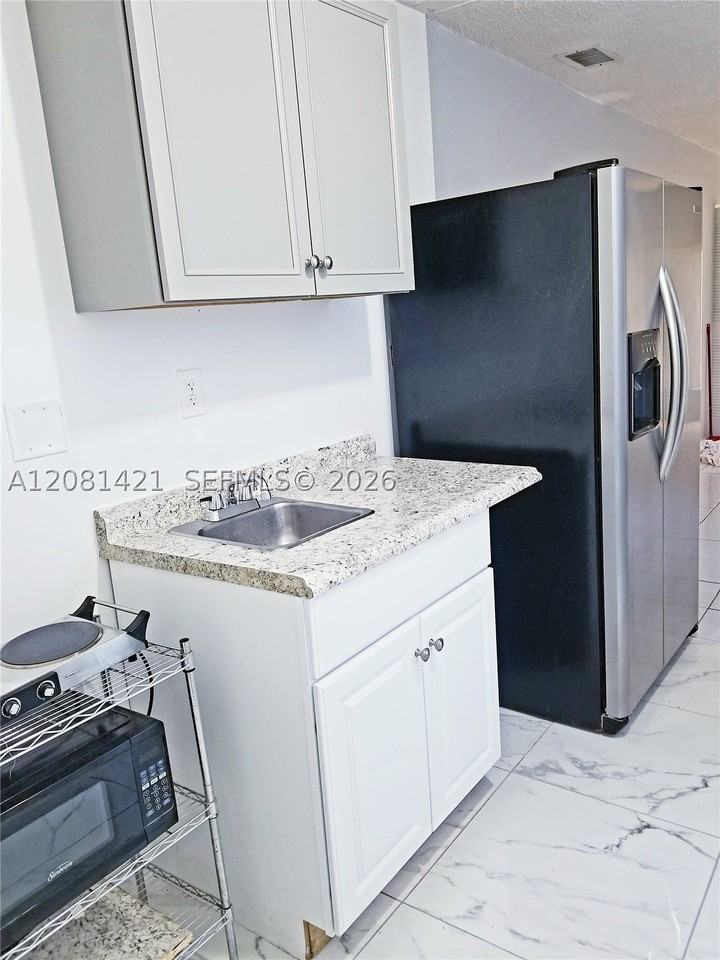 5871 Nw 199th St #5871L - Photo 5 of 13