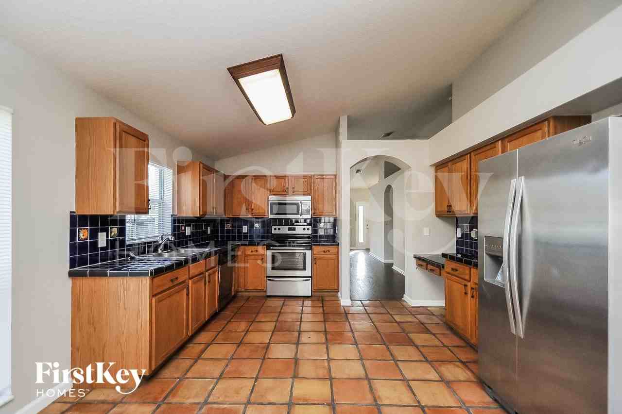 12201 Ravens Nest Pl - Photo 6 of 16