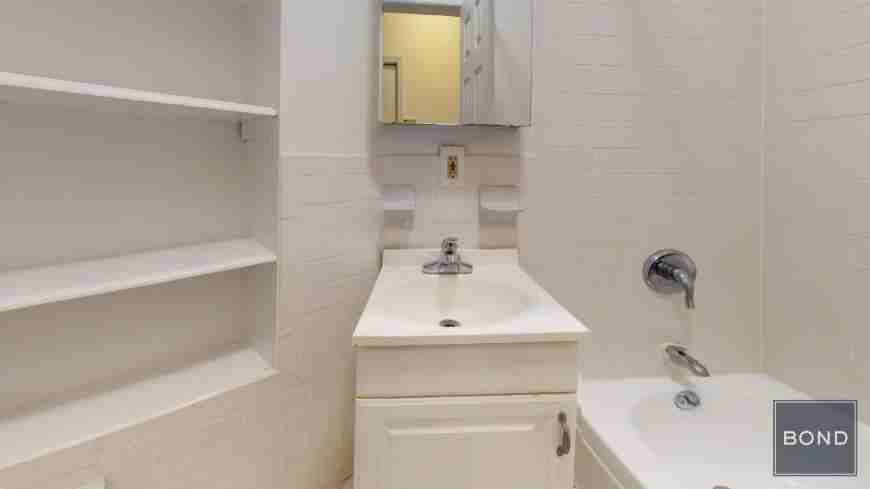 228 E 36th St - Photo 5 of 7