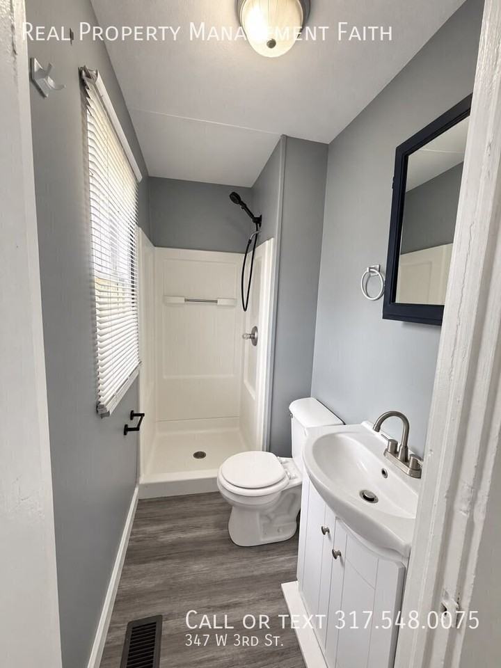 347 W 3rd St - Photo 4 of 16