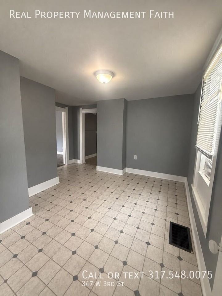 347 W 3rd St - Photo 6 of 16